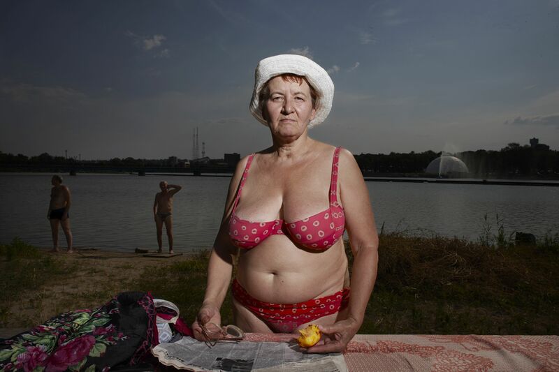 Woman with Peach #1572, from series Bathers, Ukraine 2011 - a Photographic Art by RICHARD ANSETT