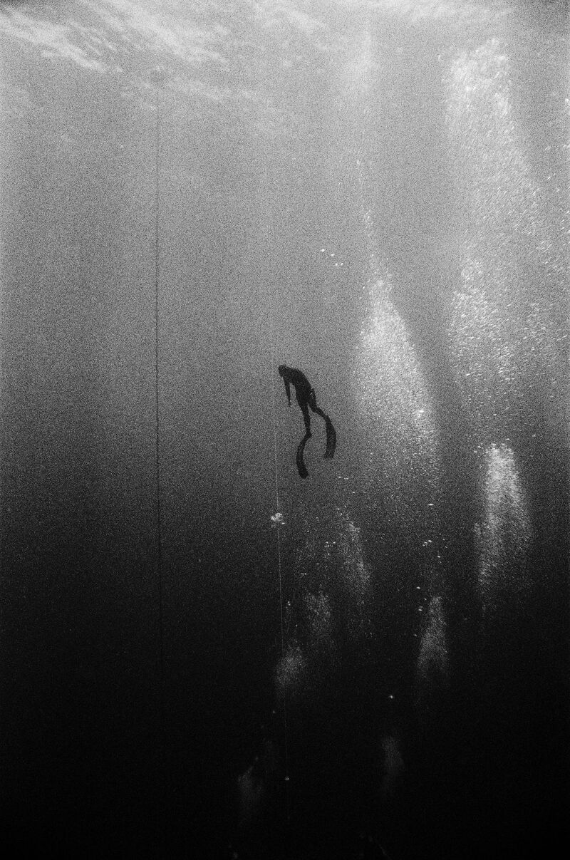 Free diver watching bubbles - a Photographic Art by pedro arieta