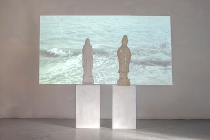 HARD WAVES (Kuanyin and Virgin Mary staring at the sea) - A Sculpture & Installation Artwork by Giuseppina Giordano