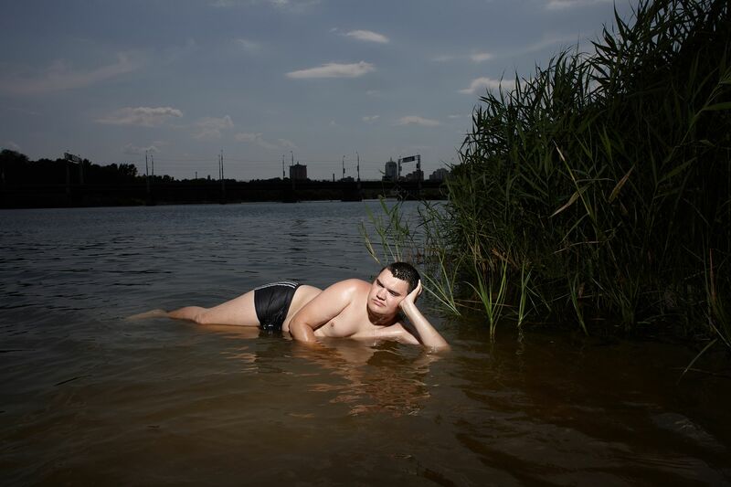 Reclining Boy in Water #1804, from series Bathers, Ukraine 2011 - a Photographic Art by RICHARD ANSETT