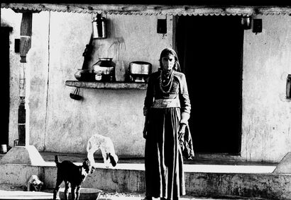 Woman on the doorstep. Rajasthan. India - A Photographic Art Artwork by Rick Margiana
