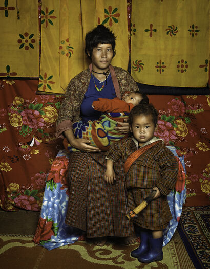 “Mother and childs” (Dorji Pema 22 years old Monpa farmer: Kinzang 2 years olf & Legshey 2 months old) - a Photographic Art Artowrk by Roberta Marroquin