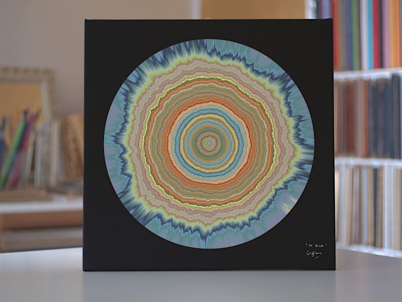 M Disk - a Digital Graphics and Cartoon by Graeme Boore