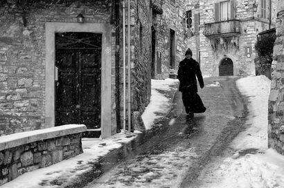 Priest walks in the snow - a Photographic Art Artowrk by Andrea Mattia