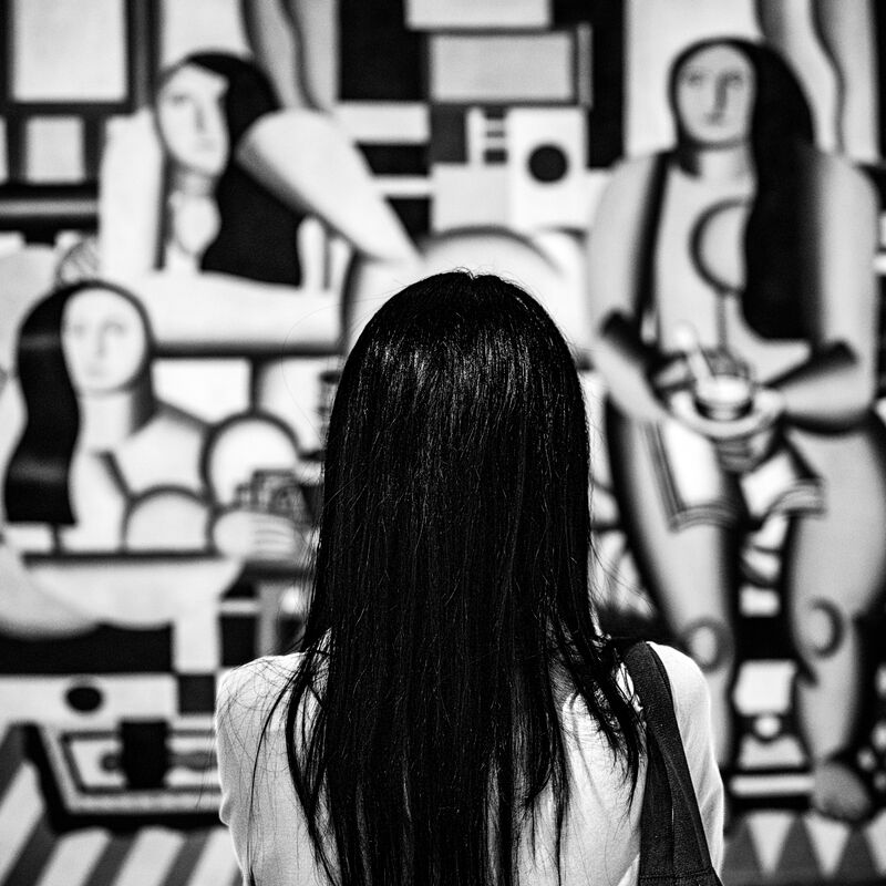 Four women with black hair - a Photographic Art by Adrian Schaub