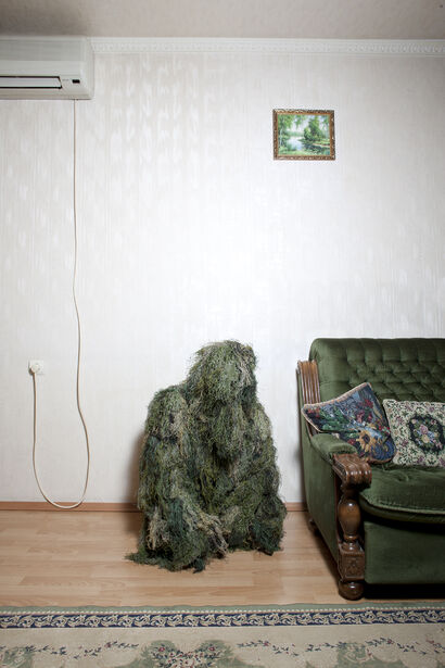 Man in Camouflage with Sofa #2804, Donbas, Ukraine 2011  - a Photographic Art Artowrk by RICHARD ANSETT