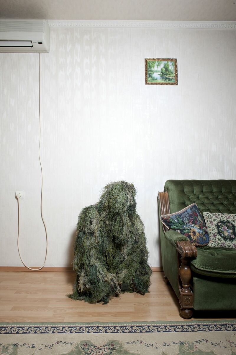 Man in Camouflage with Sofa #2804, Donbas, Ukraine 2011  - a Photographic Art by RICHARD ANSETT